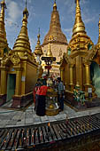 Yangon Myanmar. Shwedagon Pagoda (the Golden Stupa). Locals pray at the station around the base of the pagoda that represents the day they were born.  